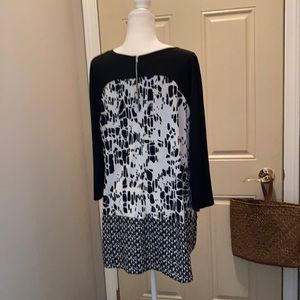 Blouse- zippered back detail.
